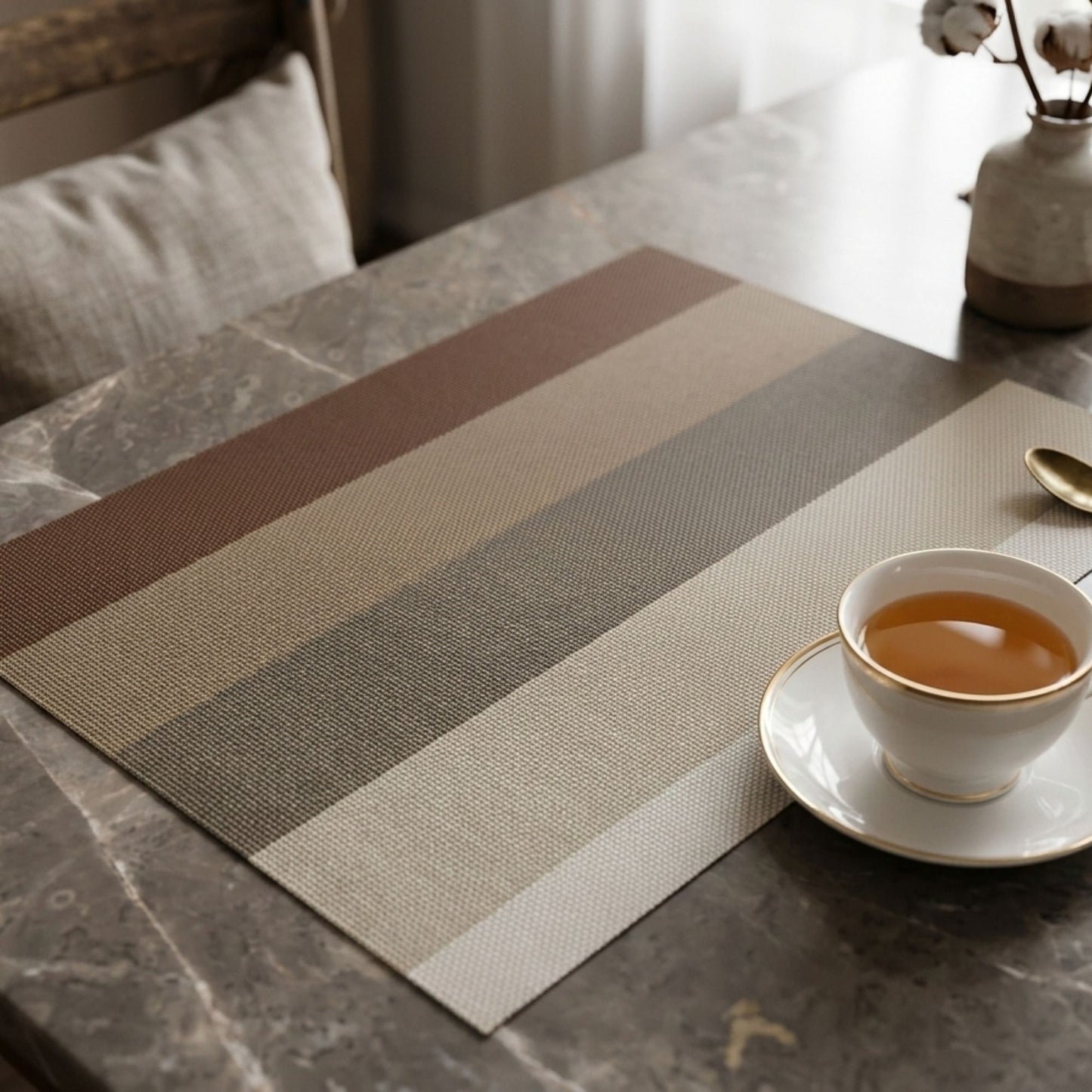Striped wire mesh rectangular dining placemat styled with cup and cutlery