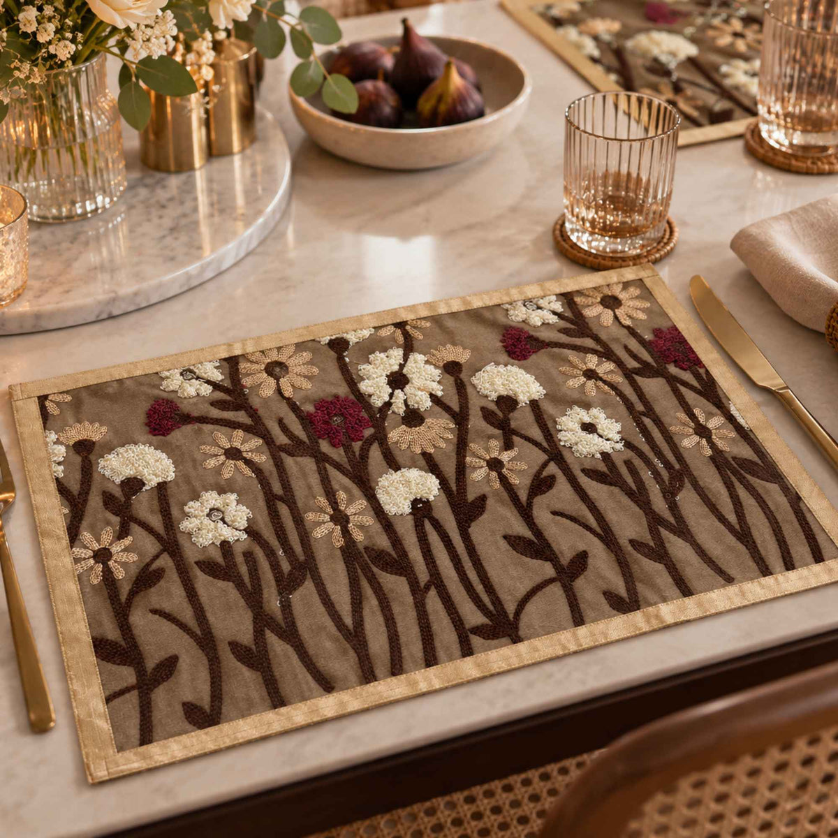 Brown floral laminated placemat from a set of 6 styled on a dining table by Supper & Scene.