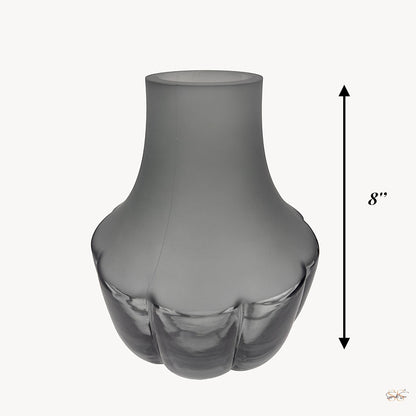Medium height grey glass vase with a frosted finish and ribbed lower design shown against a plain background.