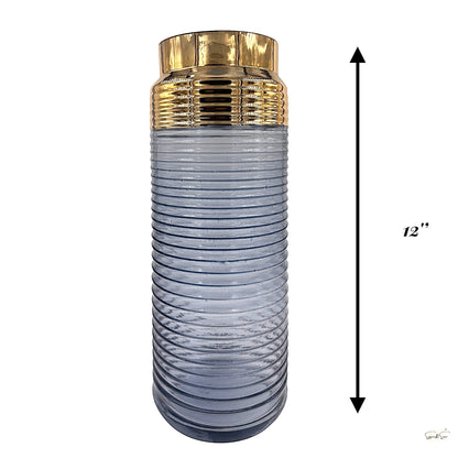 12-inch blue ribbed glass vase with polished gold neck displayed against a plain background by Supper & Scene.