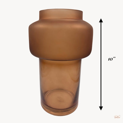  minimalist brown decorative glass vase showcasing its smooth matte finish and sculptural silhouette by Supper and Scene.