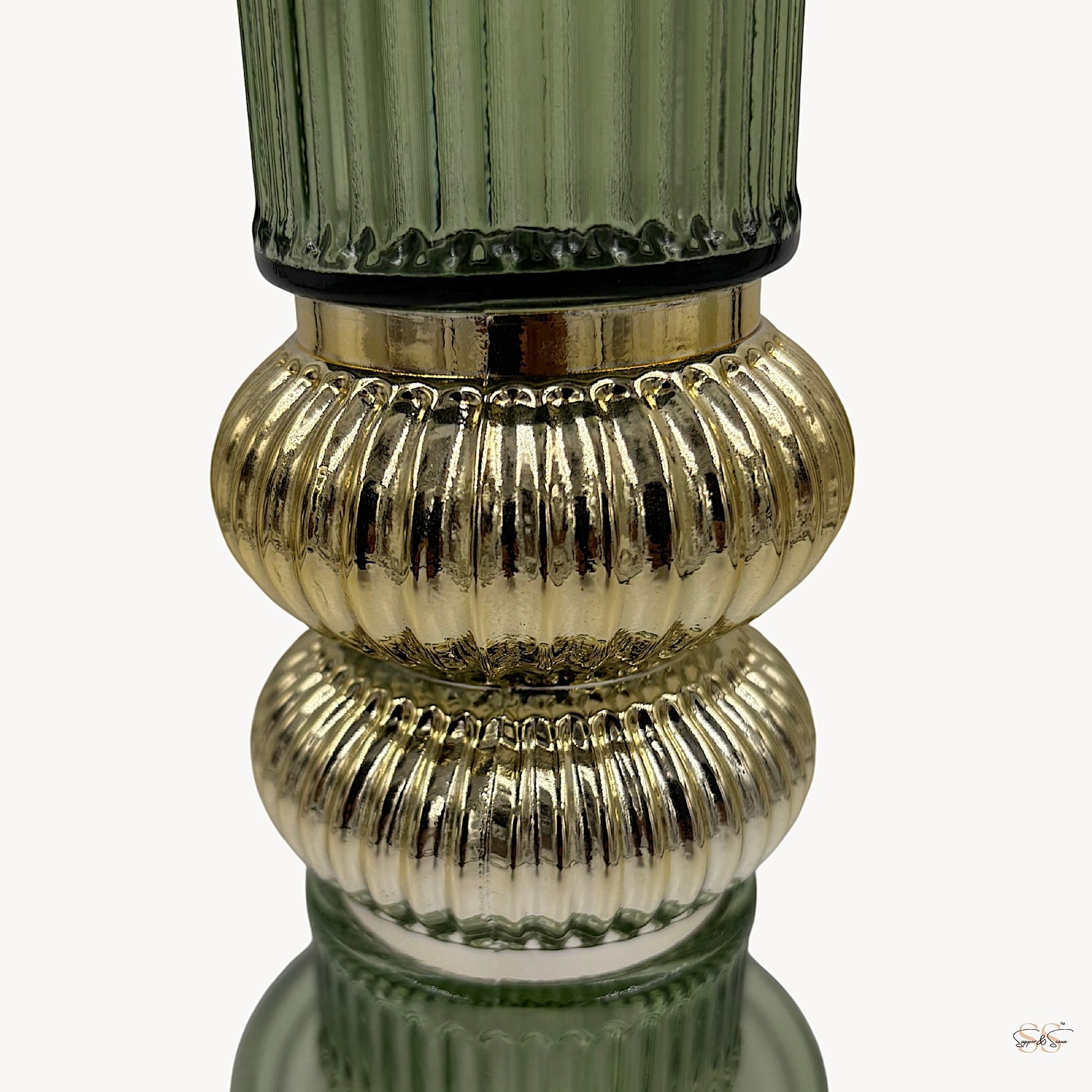Green ribbed glass vase with gold textured accents by Supper & Scene.