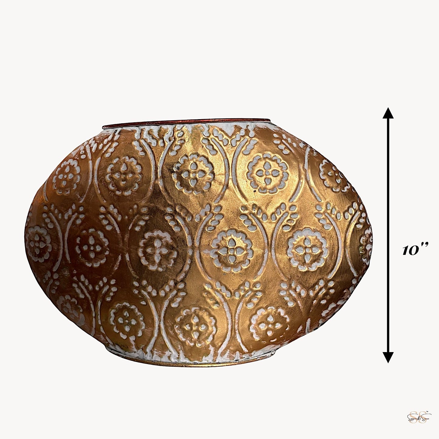 Large gold and white embossed metal décor piece with intricate floral motifs, ideal for tabletops and classic interiors by Supper & Scene.