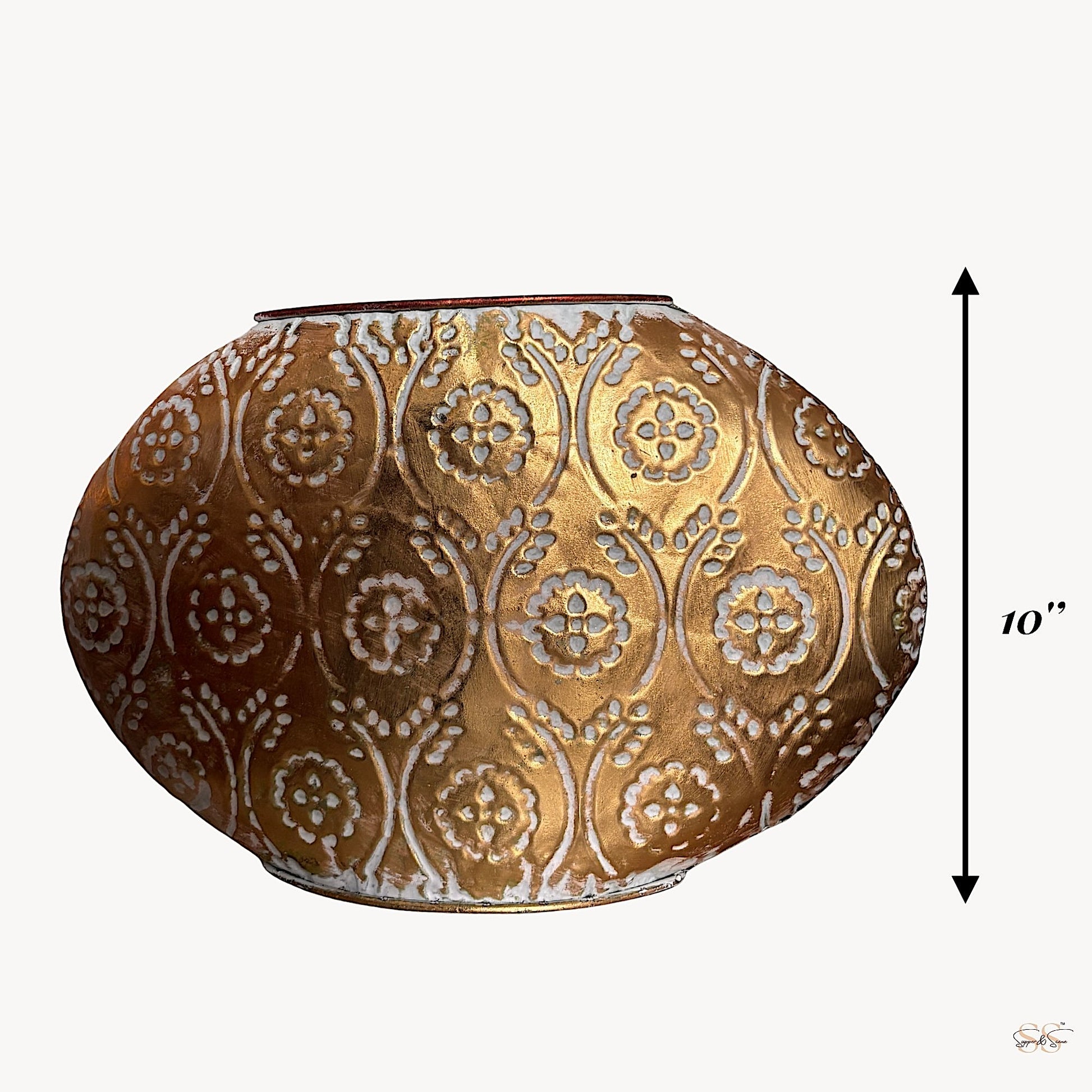 Large gold and white embossed metal décor piece with intricate floral motifs, ideal for tabletops and classic interiors by Supper & Scene.