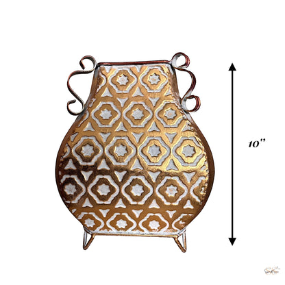 Gold and white embossed metal vase with geometric Moroccan-style pattern and curled side handles, 10-inch height by Supper & Scene.