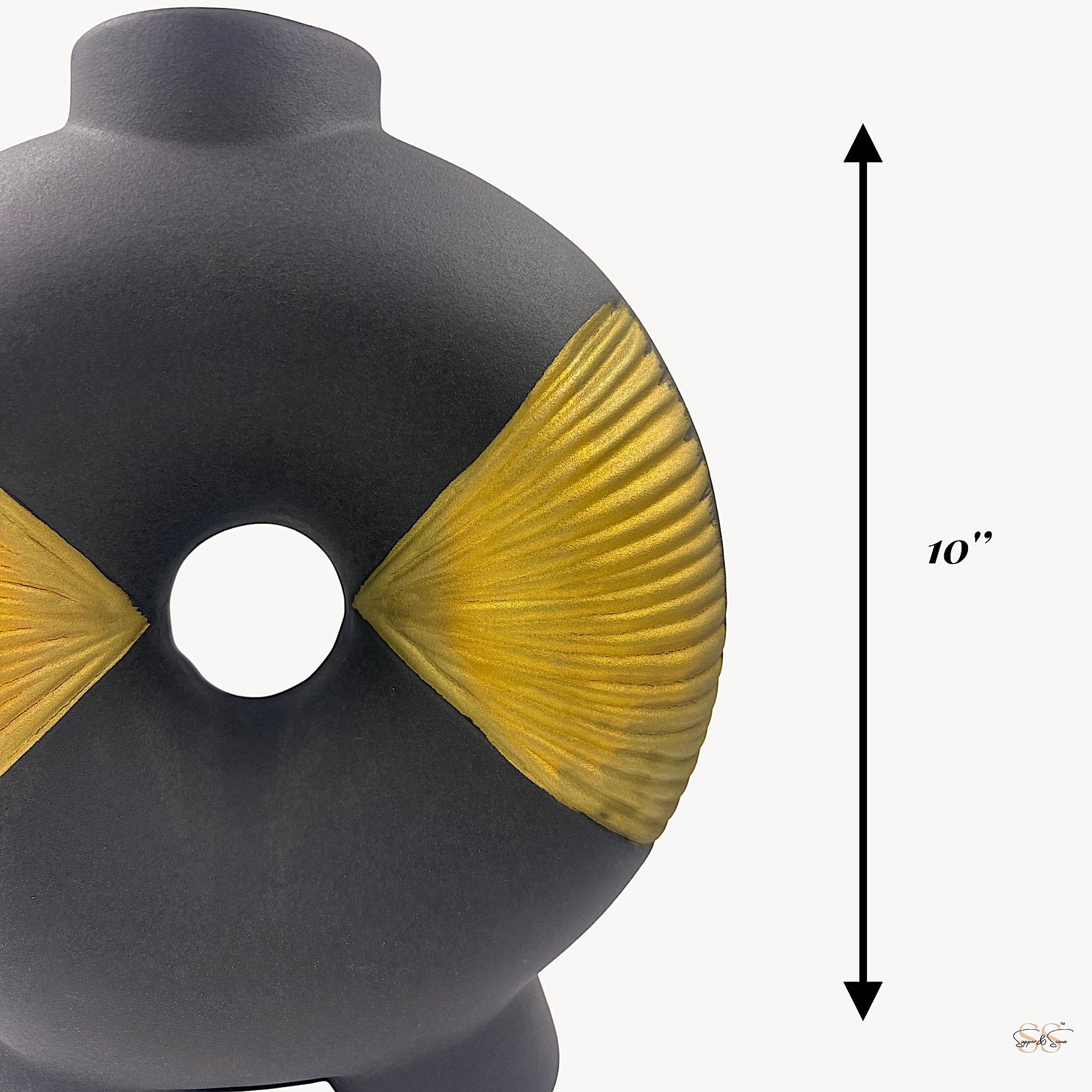 modern black-and-gold ceramic statement vase with sculpted fan motifs and a donut silhouette, shown in a 10-inch size by Supper & Scene.
