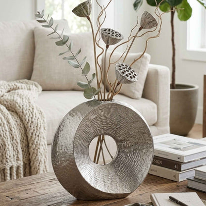 German silver metallic showpiece vase styled as a home decor accent by Supper & Scene.