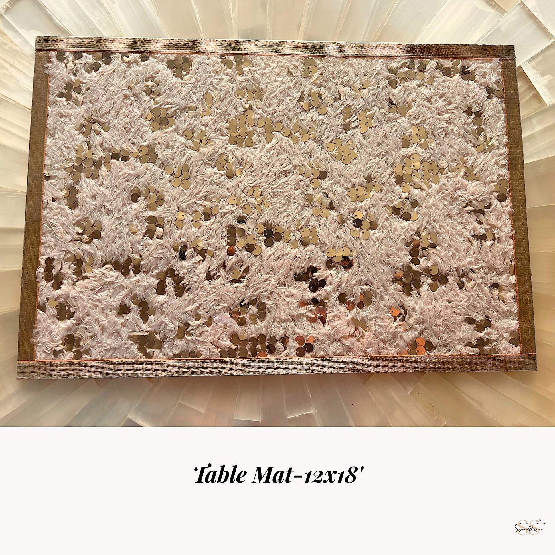 Champagne-gold textured table mat with sequin detailing for elegant table styling by Supper & Scene.