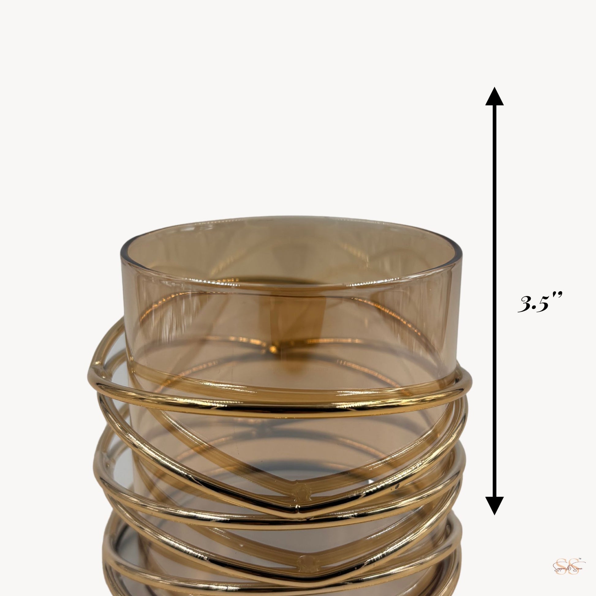 Glass vase with gold ribbed design and measurement label on a white background