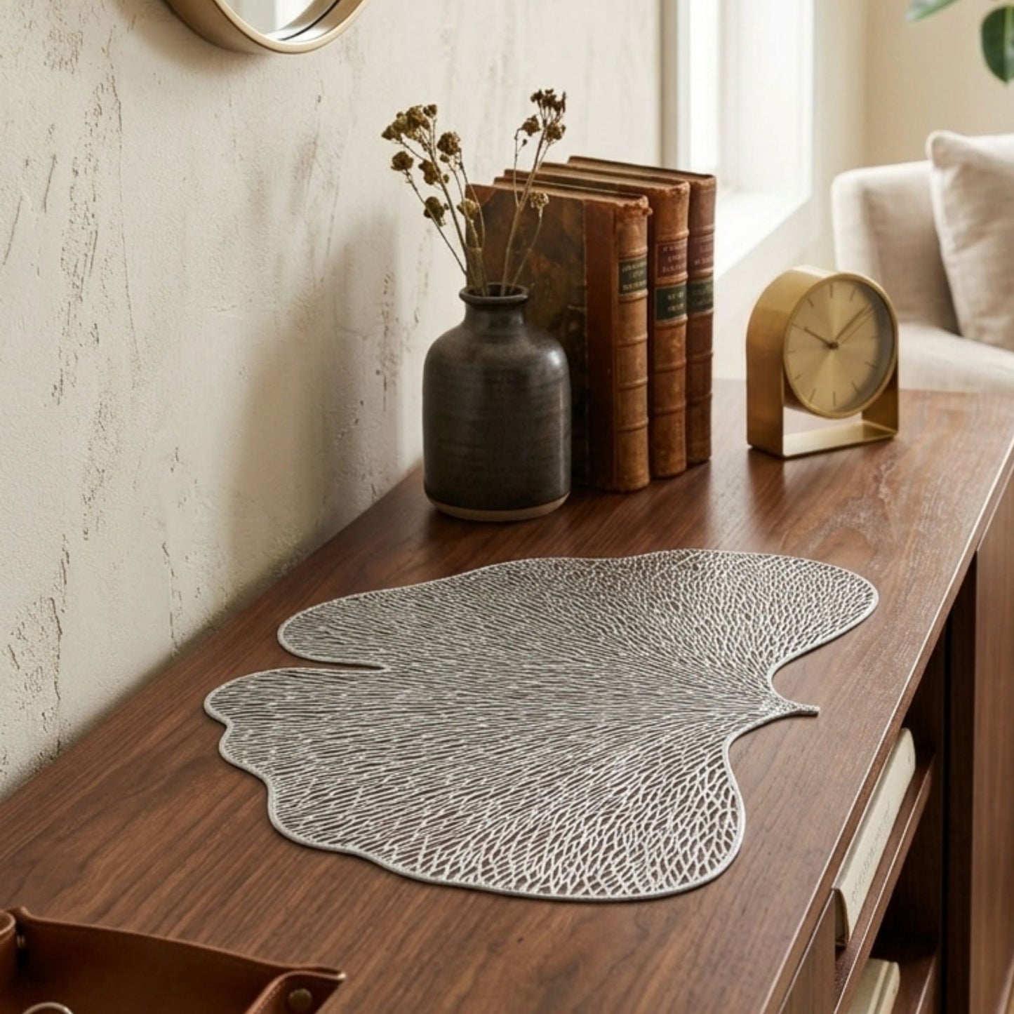 Silver PVC ginkgo-shaped side mat for console table styling by Supper & Scene.