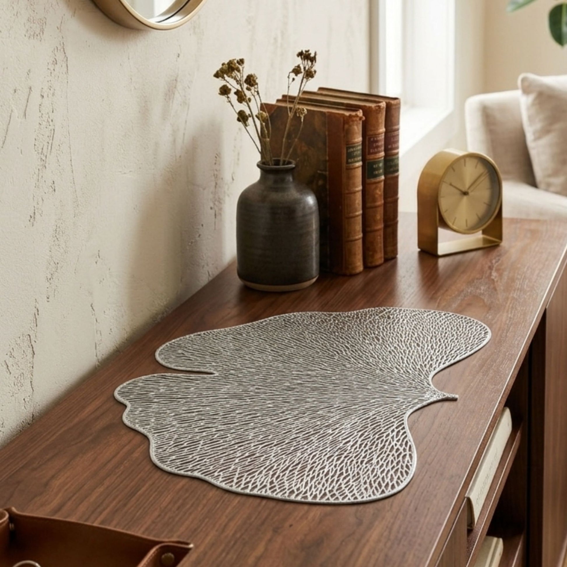 Silver PVC ginkgo-shaped side mat for console table styling by Supper & Scene.
