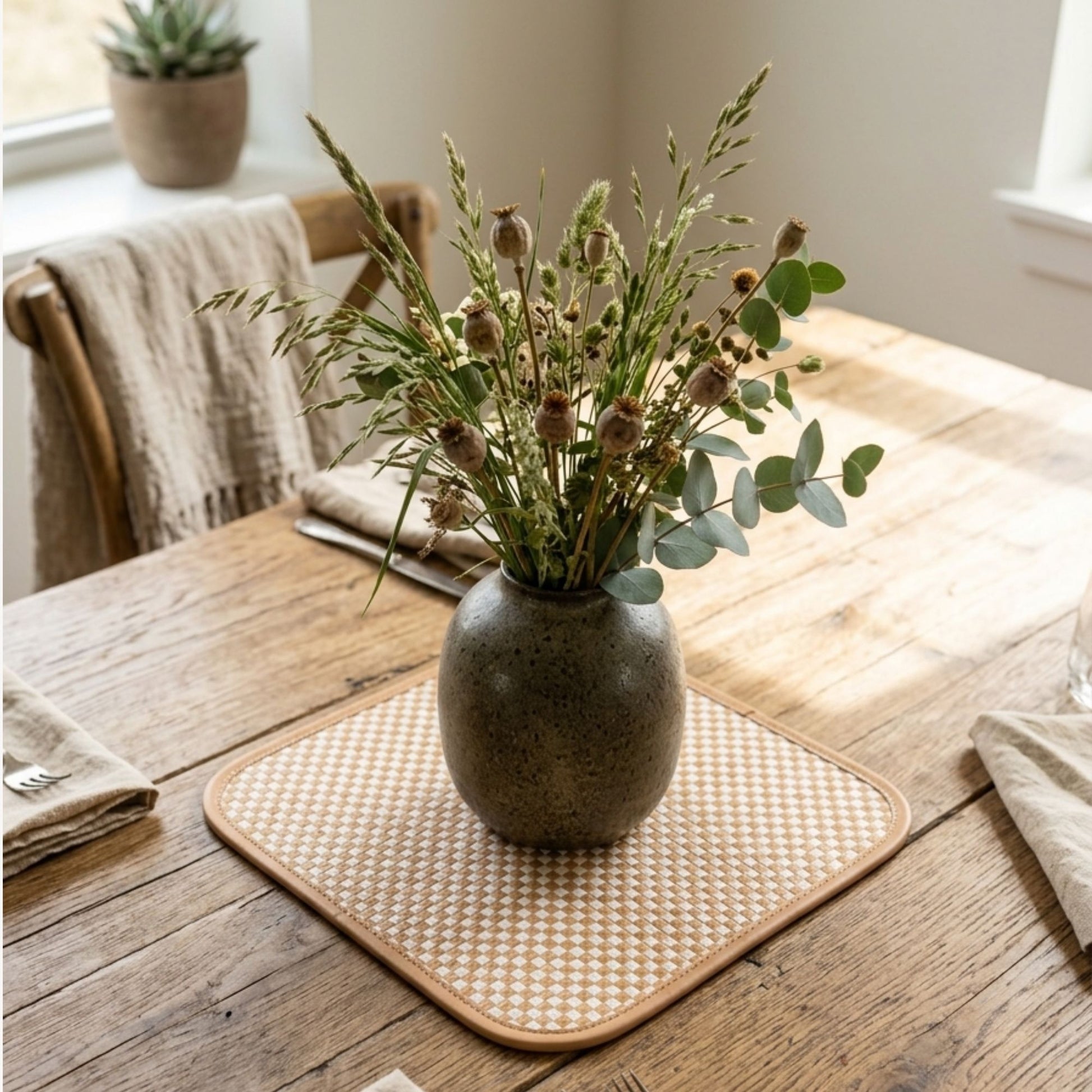 Square bamboo placemat set of 2 natural woven table mat styled with vase on wooden table