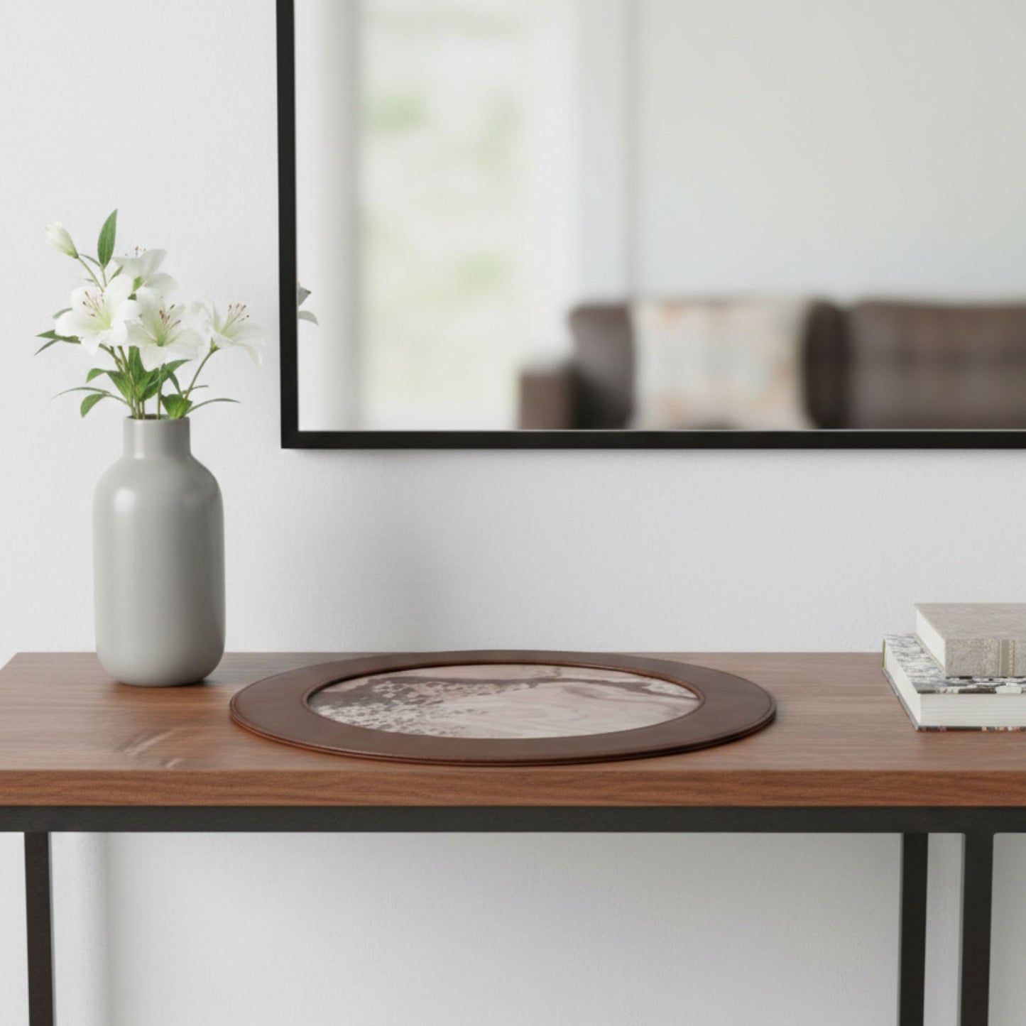 round brown leather side table mat on a console
